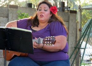 Merlinda Espinoza singing at Caravan to Cuba event